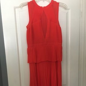 Gorgeous peplum coral/red BCBG MaxAzria dress.